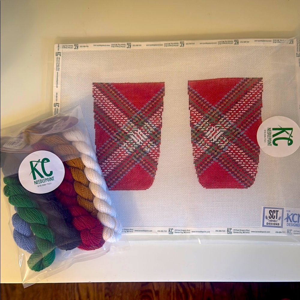 Needlepoint canvas with threads